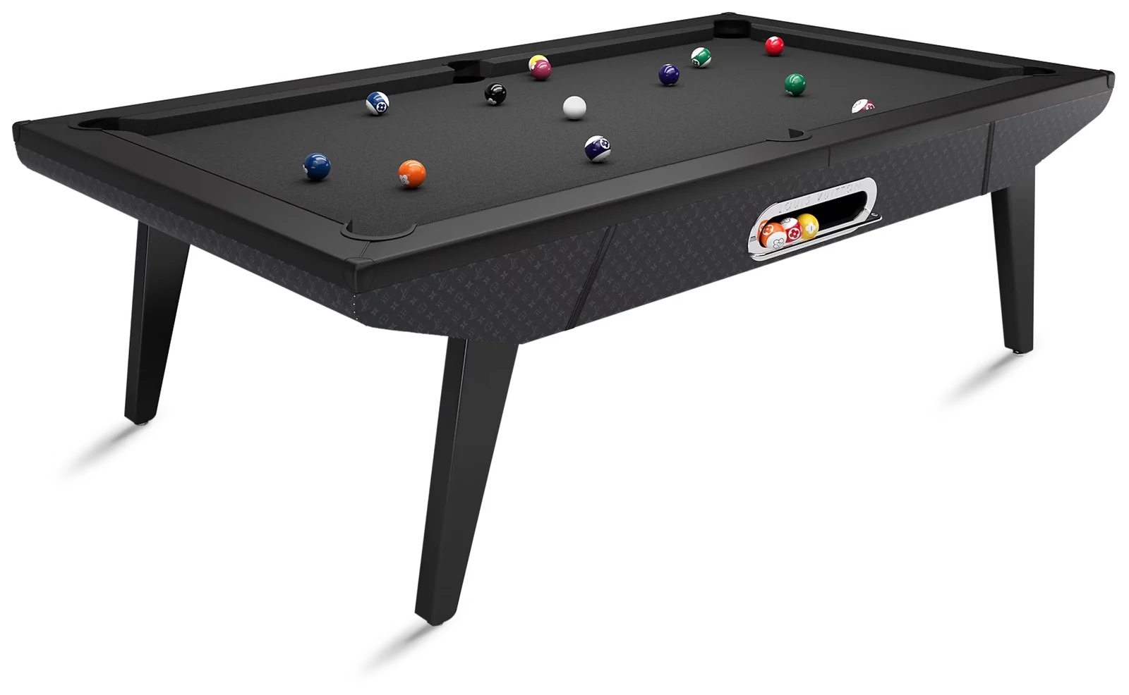 Black pool table with a full set of balls on the cloth